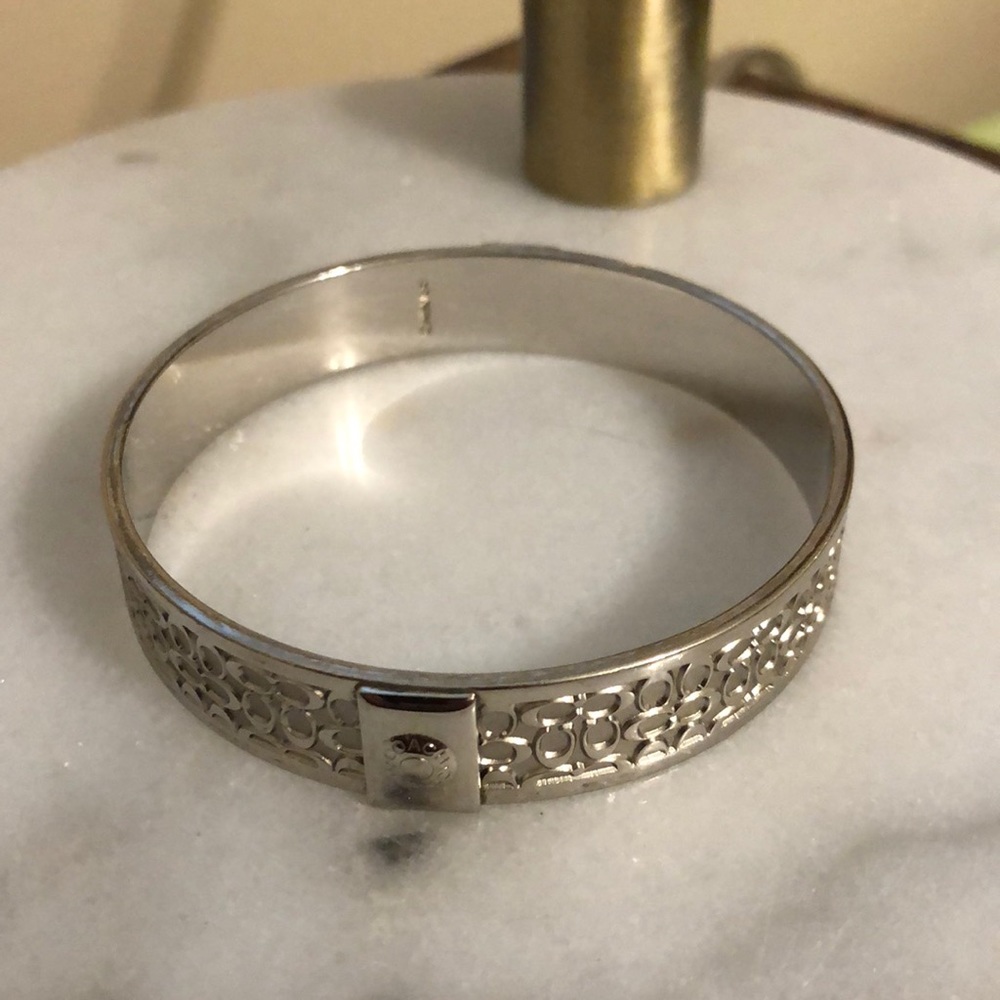 Authentic Coach signature silver bangle